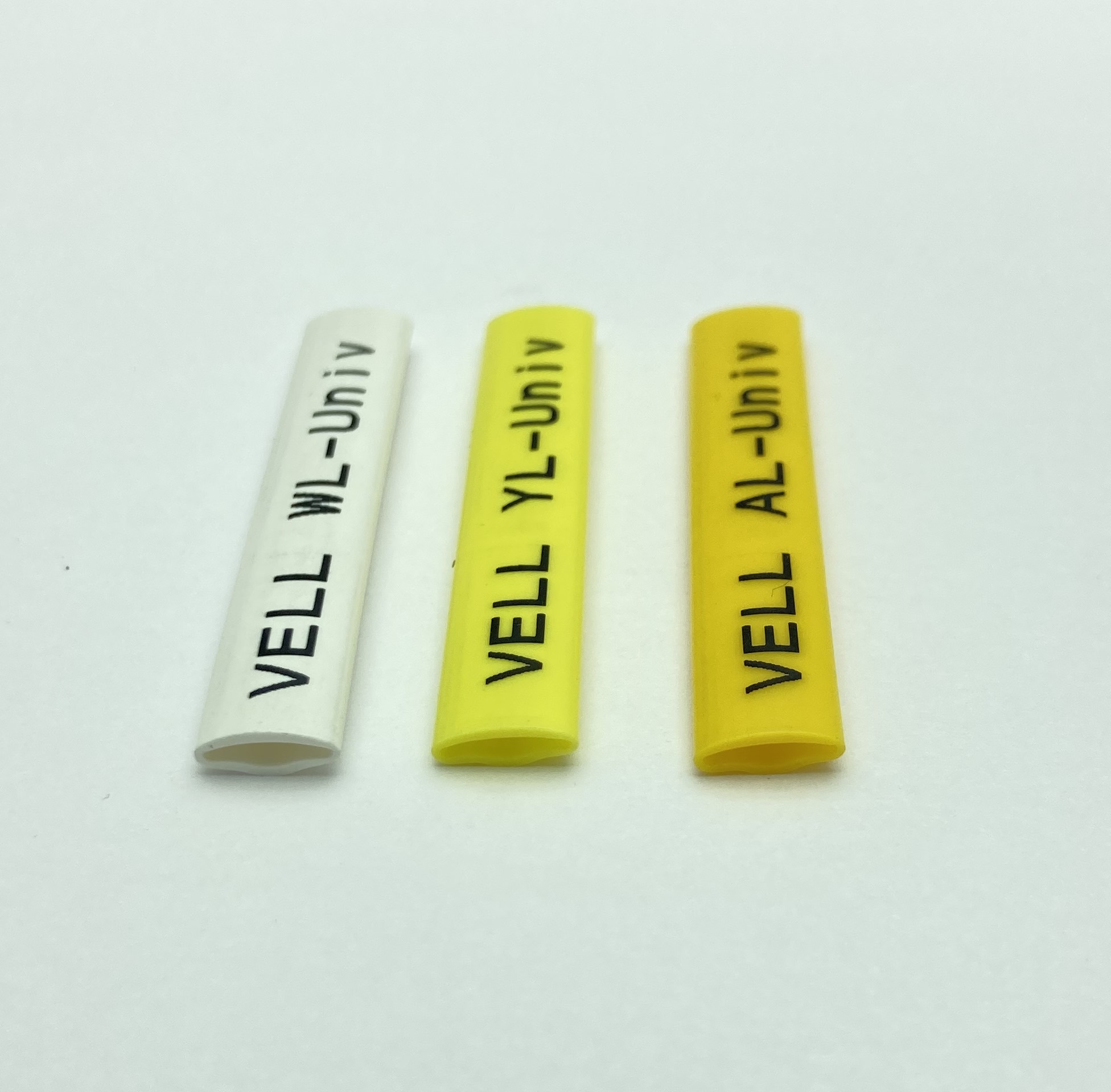 Фото Профиль ПВХ овальный Vell YL-Univ для маркировки проводов, Ø 2,8-3,8 мм, 200 метров, желтый (самозатухающий) {YL-Univ} (3)