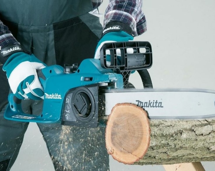 Фото Пила цепная электрическая Makita UC4041A (1800 Вт, 40см, цепь3/8"56зв, 4,7кг, автомат. смазка (8)